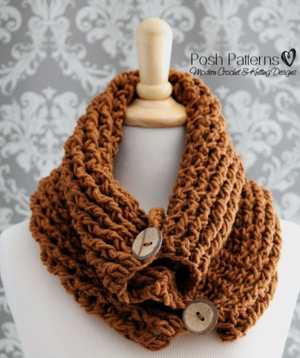 A crochet button cowl worked in chunky post stitches.