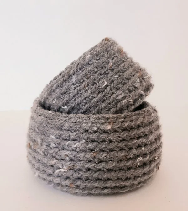 Two small crochet nesing baskets.