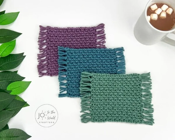 Three simple crochet mug rugs.