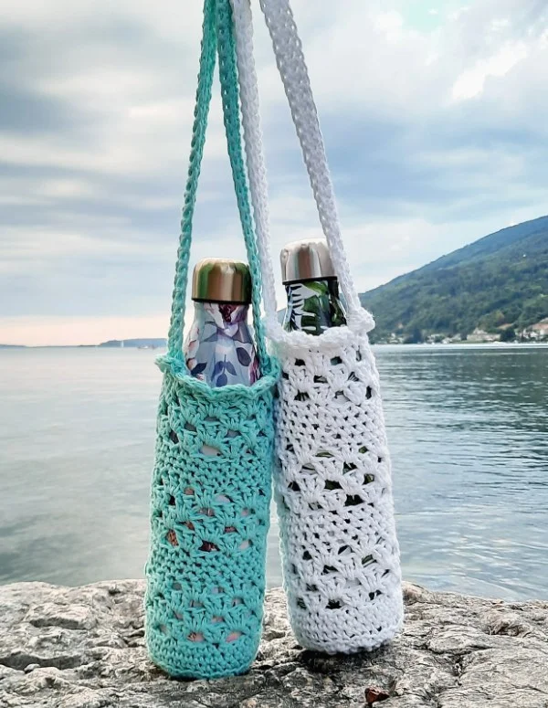 Two crochet water bottle holders featuring the granny stripe stitch.