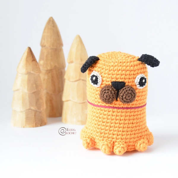 A cartoon-style crochet Pug.