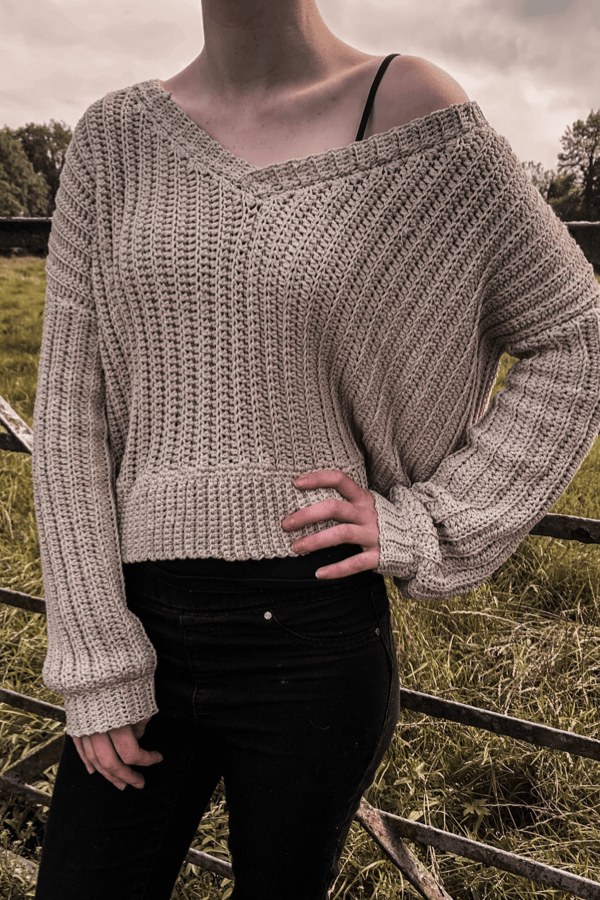 A ribbed v-neck crochet sweater.