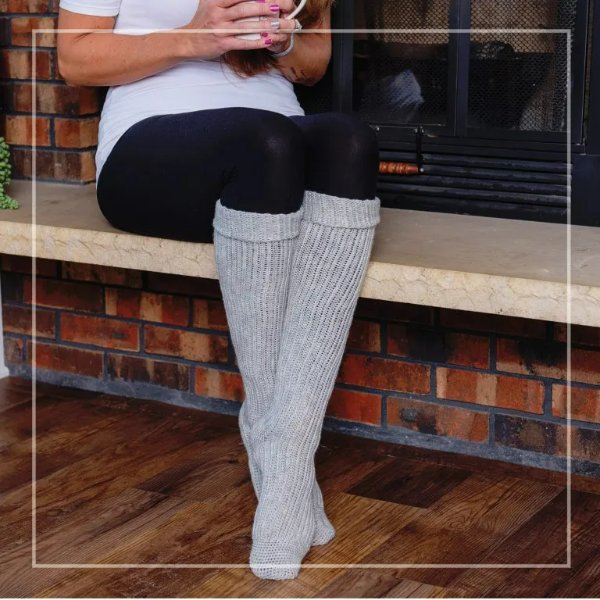 Grey, knee-high crochet socks.