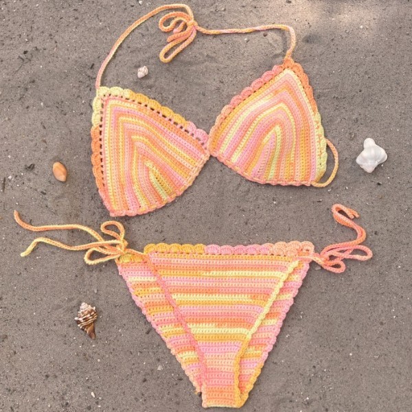 A flat lay image of crochet triangle bikinis.