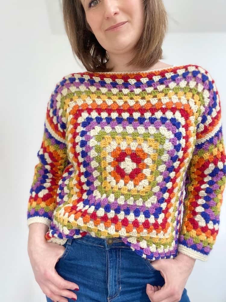 A rainbow coloured, boxy granny square sweater.