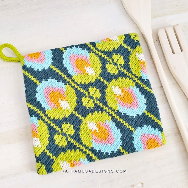 A brightly coloured vintage crochet potholder.