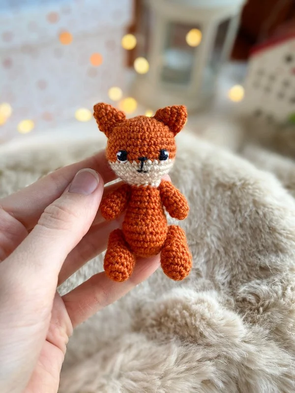 https://crochetscout.com/wp-content/uploads/2024/03/tiny-fox-crochet-pattern.jpg.webp