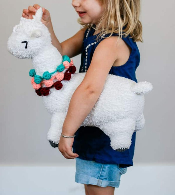 A large crochet alpaca stuffy toy.
