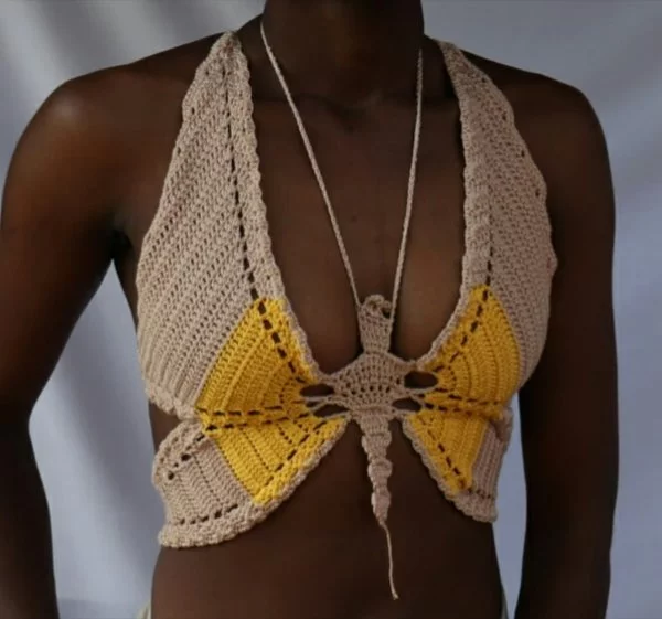 A two-toned crochet butterfly top.