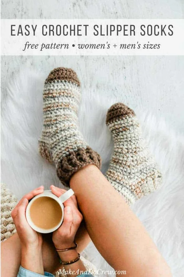 A closeup of a perons feet wearing crochet slipper socks.