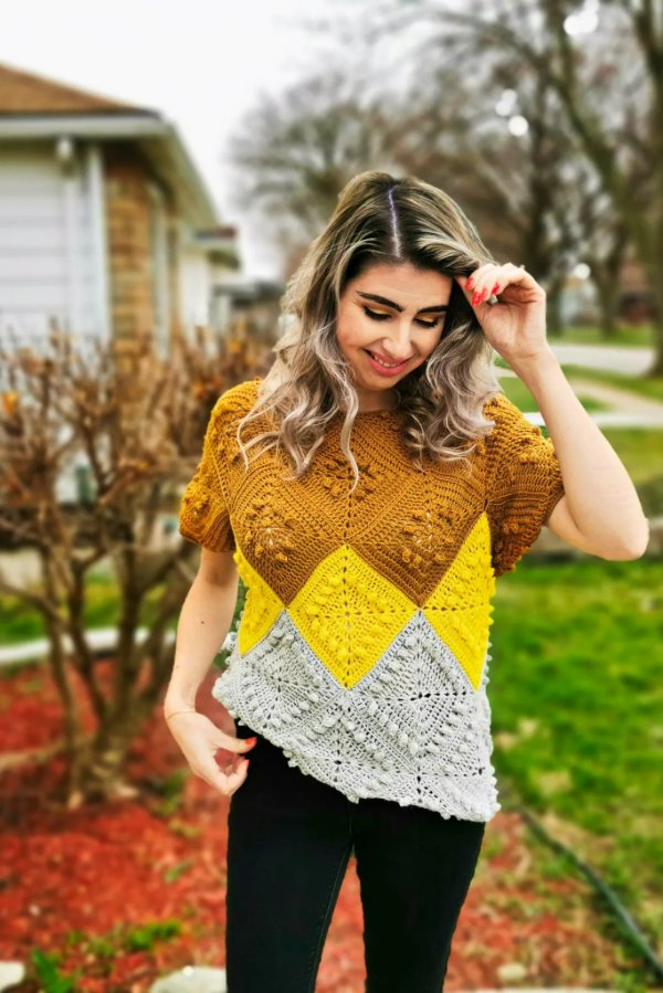 A colour blocked granny square shirt.