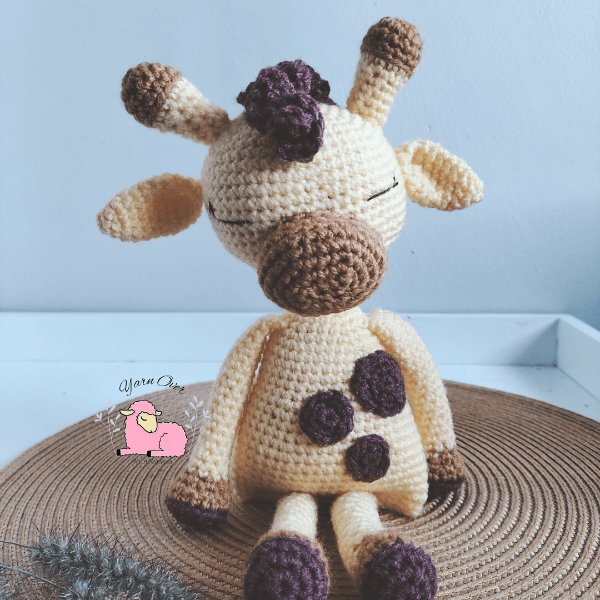Rga-doll-style-crochet giraffe toy.