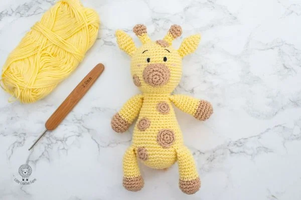A soft and floppy crochet giraffe.