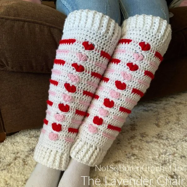 Crochet leg warmers with cute heart motifs.