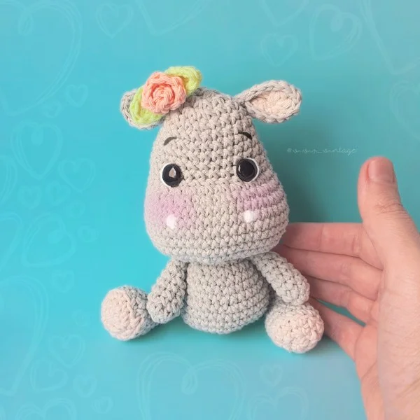 A beautiful example of a crochet hippo amigurumi.