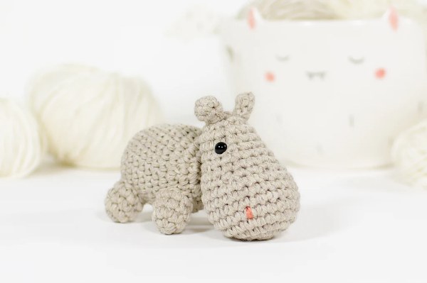 A small grey crochet hippo.