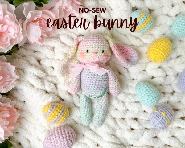 A soft, pastel-coloured crochet easter bunny.