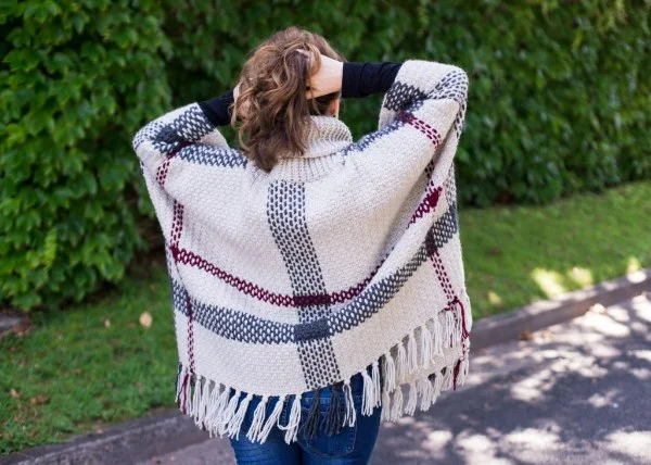 A tartan design crochet poncho.