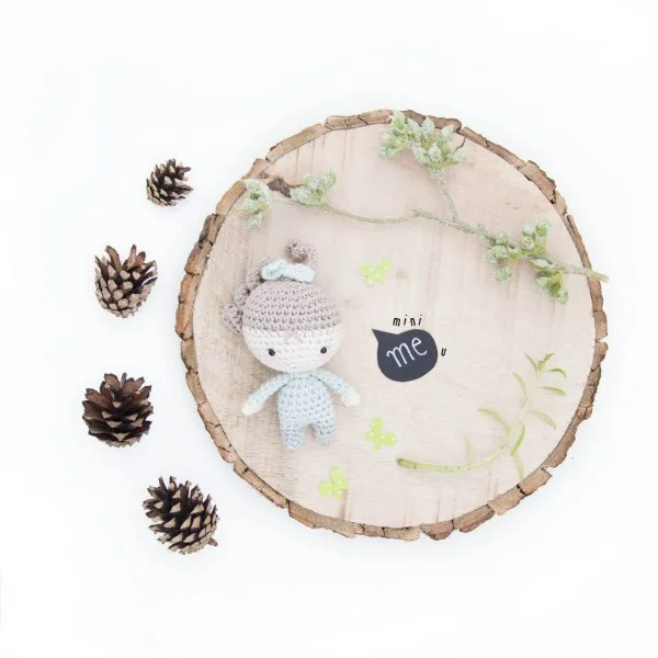 A cute mini crochet doll.