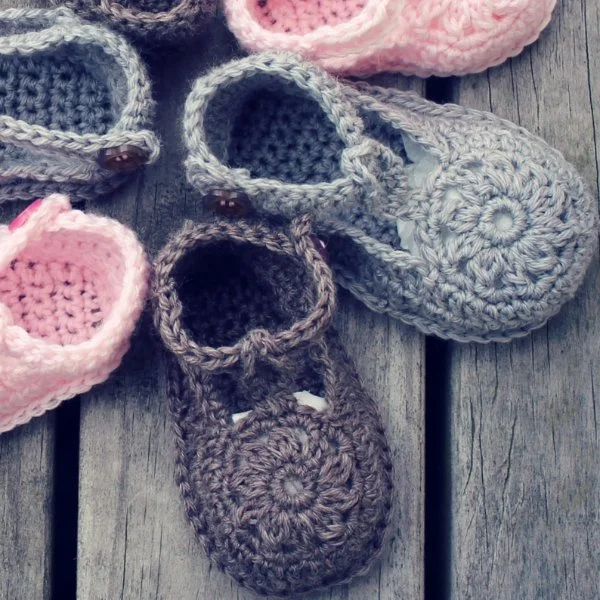 Crochet Mary Janes with flower motifs on the toes.