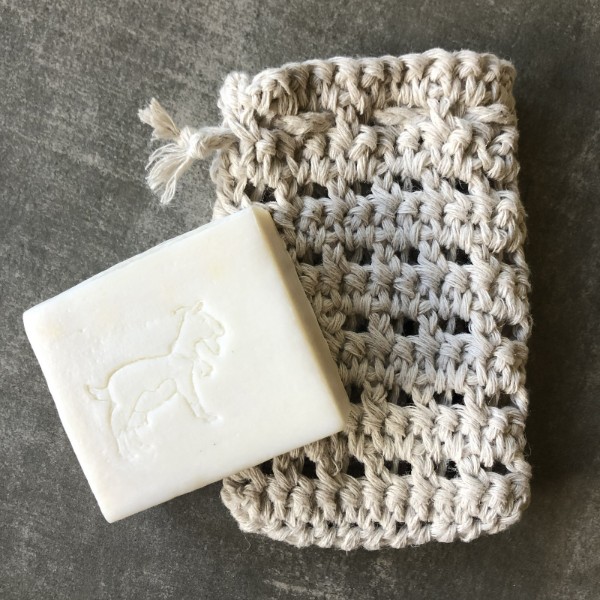 A hemp cotton crochet soap sack with eyelet detail.