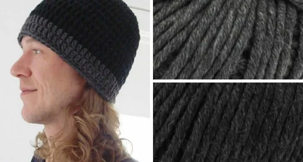 Side view of a two tone, crochet men's hat.