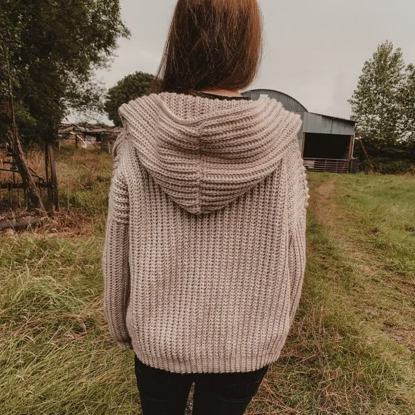 Back view of a crochet hooded cardigan.