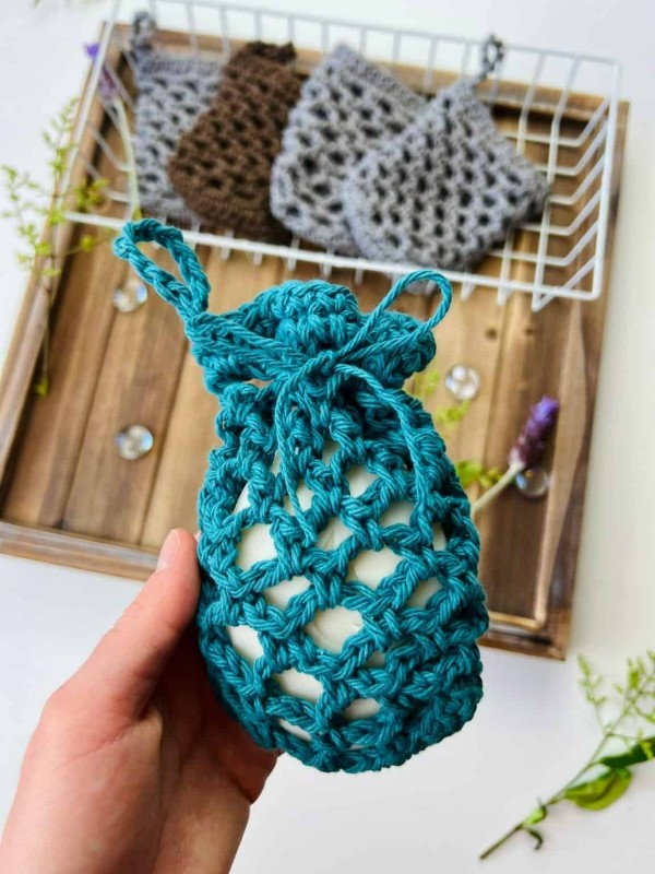 A croichet soap saver with an open mesh stitch design.