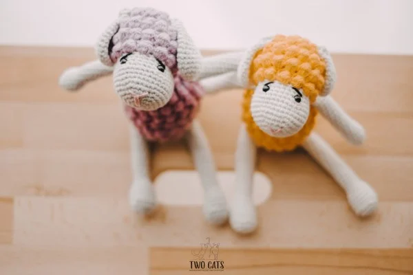 Beautiful crochet sheep toys with long legs.