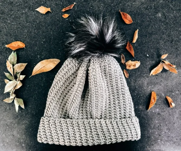 a flat crocheted slouch beanie. 