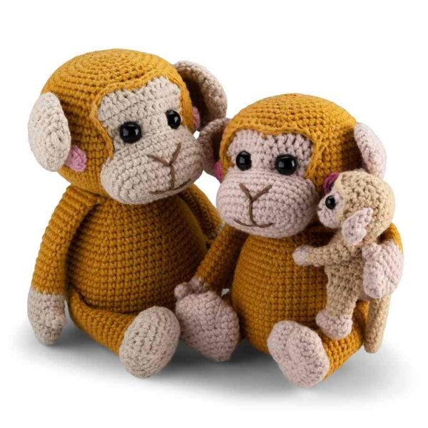 A family of crochet monkey amigurumi, including a little baby.