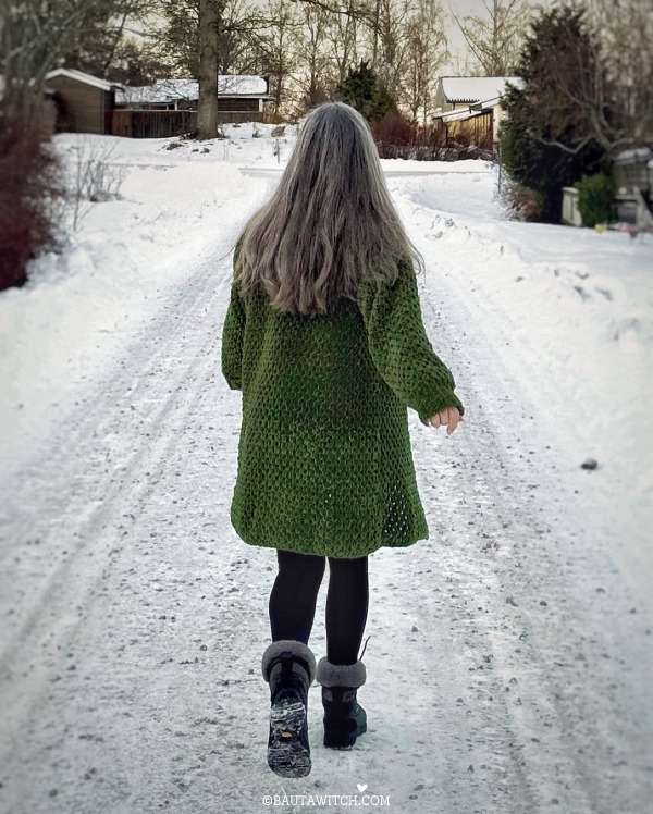 A green velvet crochet duster.