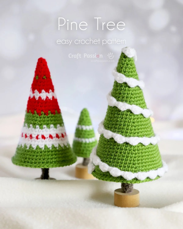 Three different sized crochet Christmas trees in different styles.