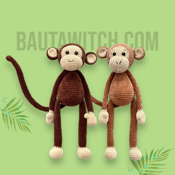 Two crochet monkeys with long tails.