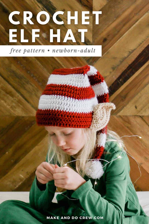 A child wearring a crochet elf hat with ears.