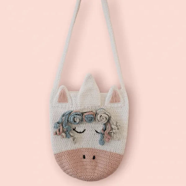 A unicorn-themed kids' crochet bag.