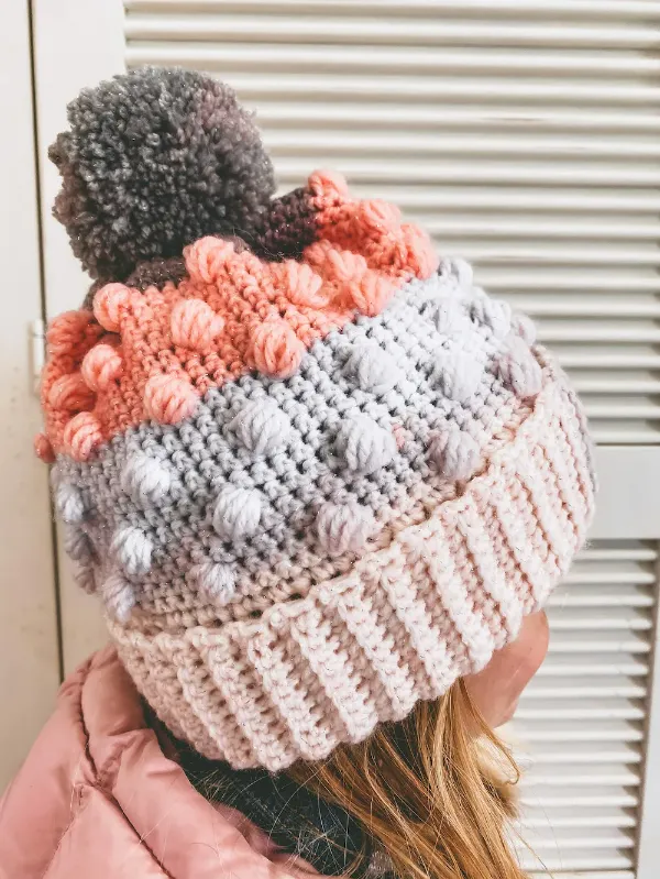 Bobble stitch children's beanie with a double brim.