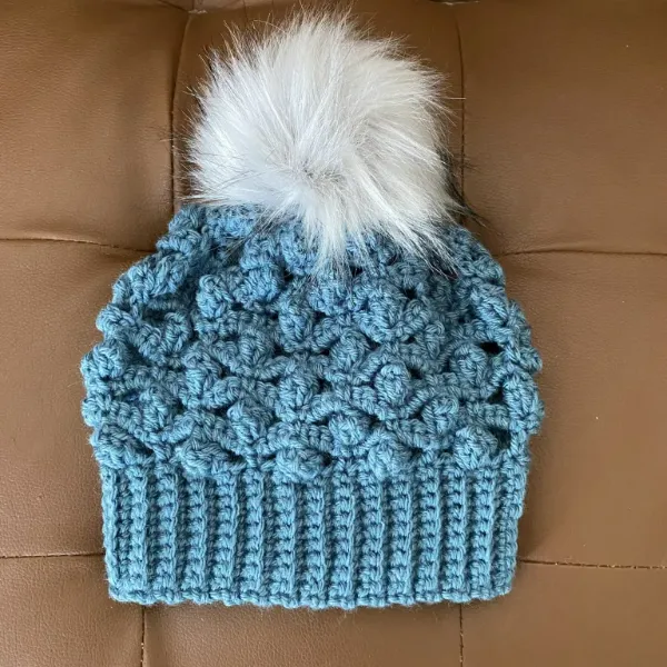 Crochet Kids' beanie with textured stitch design.