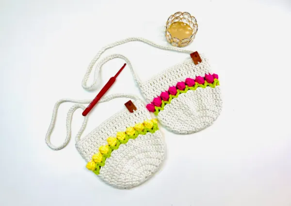 Crochet toddler bags with tulip stitch detail.