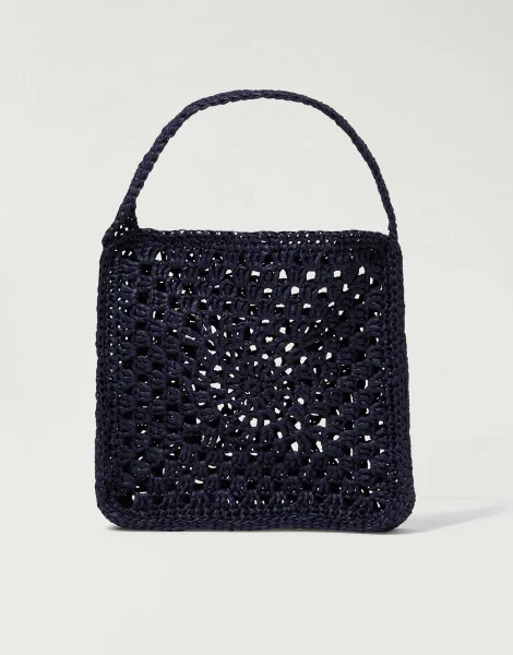 A black crochet handbag.