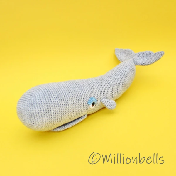 A crochet toy sperm whale.