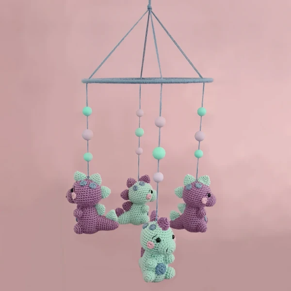 A crochet dinosaur mobile.