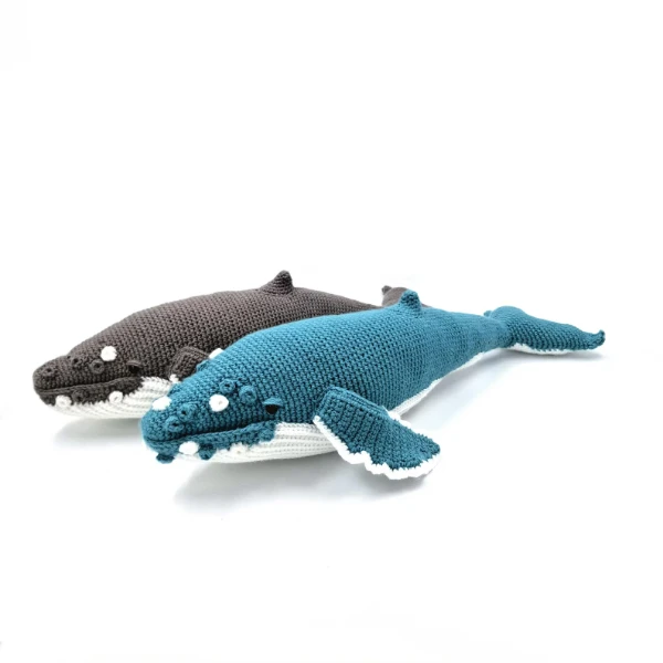Two big, realsistic crochet humpback whale toys.