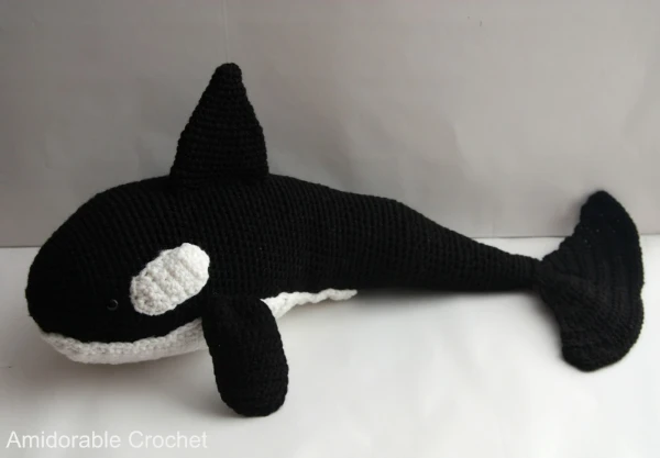 Large crochet orca toy.