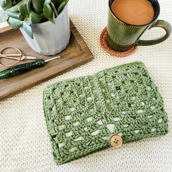 A green, granny square book cover.