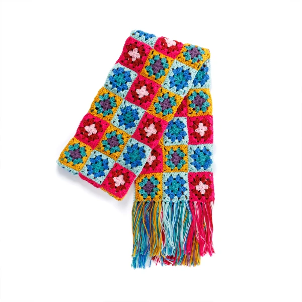 A brightly coloured crochet scarf made with mini granny squares.