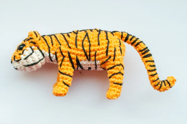 A realistic amigurumi crochet tiger toy.