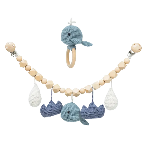 A whale themed crochet pram chain toy.