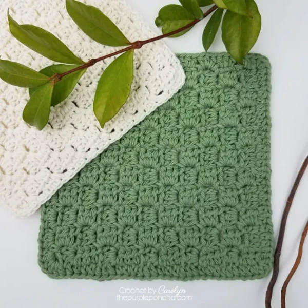 Green and white c2c crochet dishcloths.