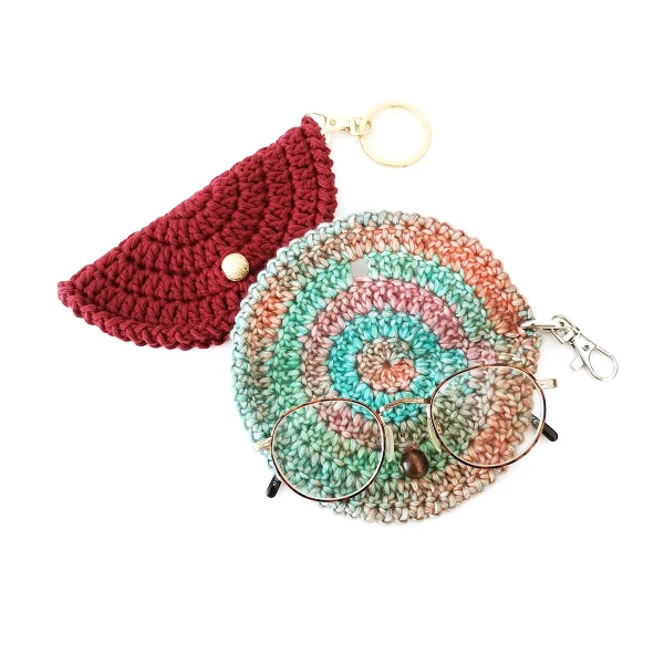 Circular crochet glasses cases.